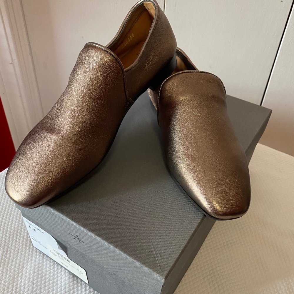 Aquatalia gold metallic loafers.